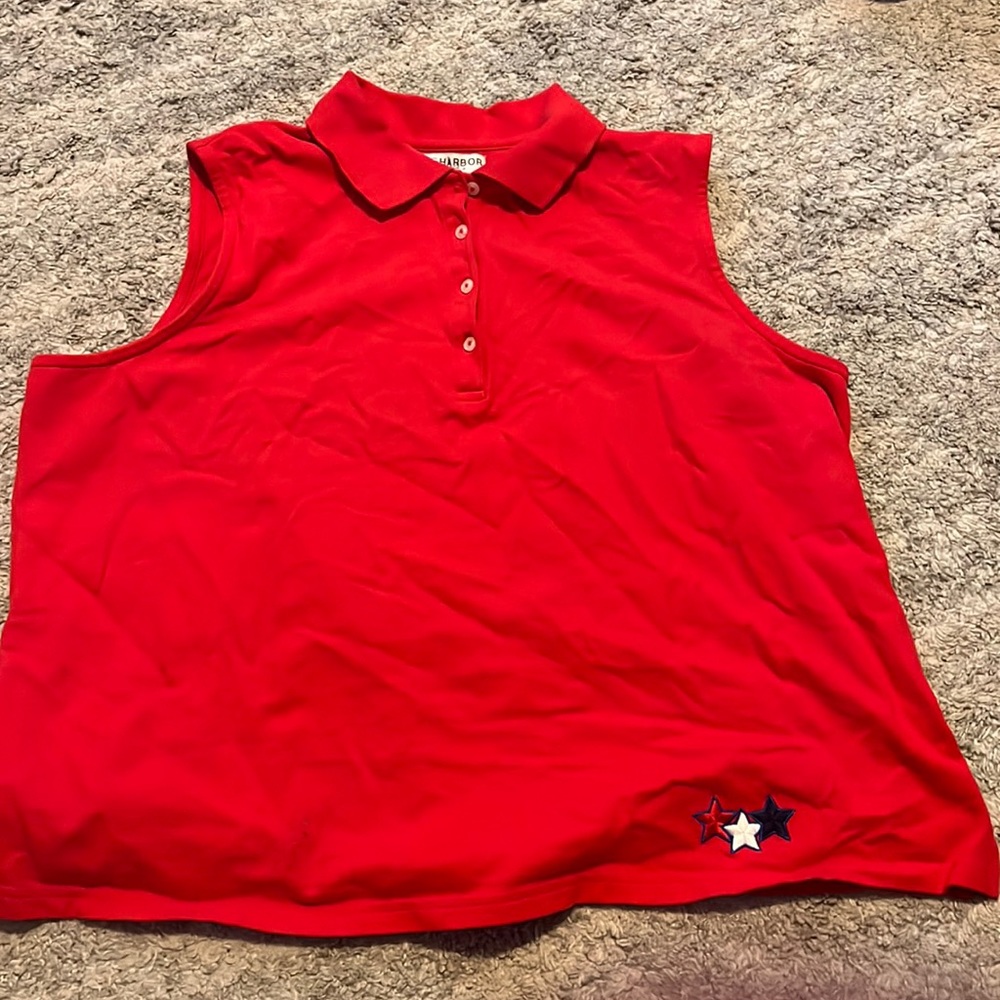 Cropped button down sleeveless red shirt.